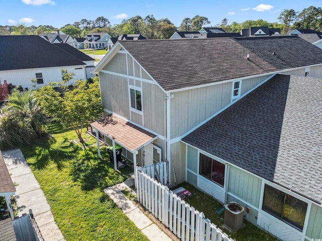 birds eye view of property with a residential view