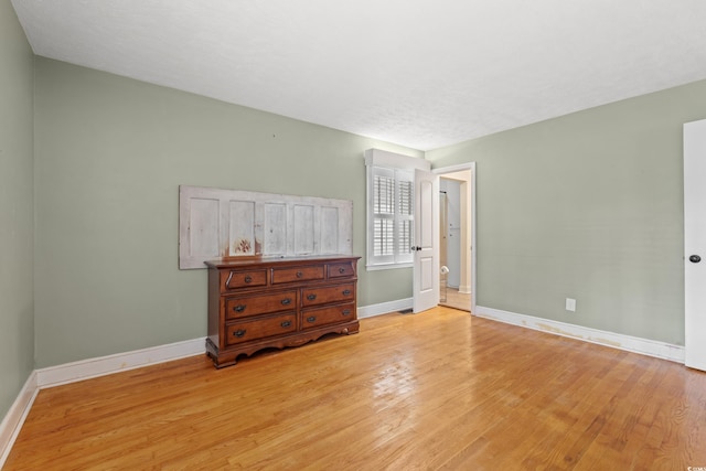 5033 Brantwood Dr, Mullins, SC 29574 - bedroom featuring baseboards and light wood-type flooring