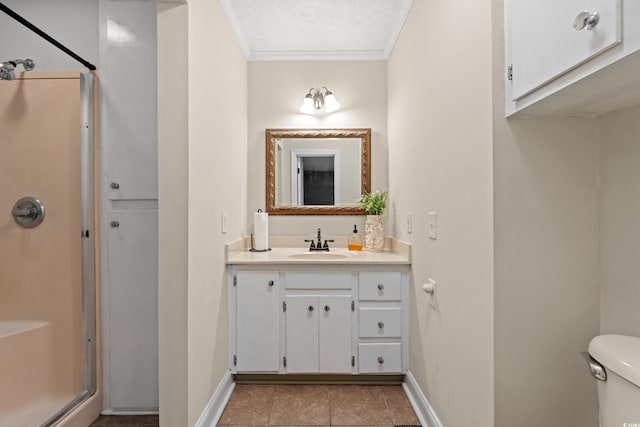 5033 Brantwood Dr, Mullins, SC 29574 - bathroom with tile patterned floors, a stall shower, vanity, baseboards, and ornamental molding
