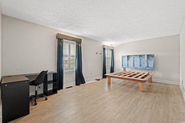 5033 Brantwood Dr, Mullins, SC 29574 - interior space with baseboards, light wood-style floors, and visible vents
