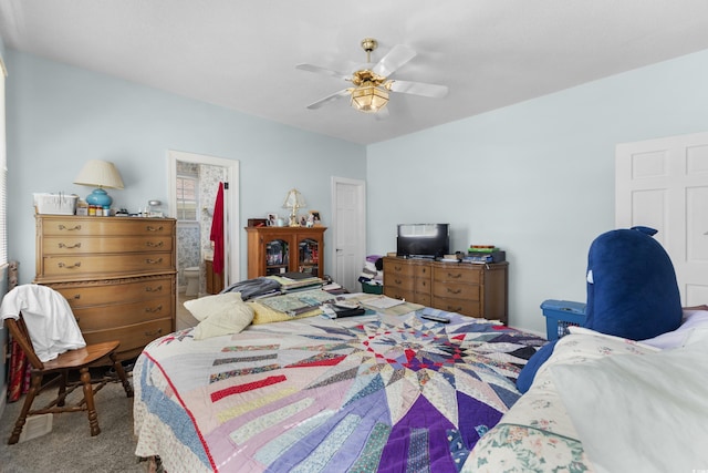 carpeted bedroom featuring a ceiling fan