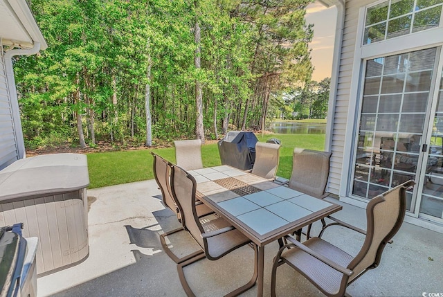 1249 Trent Dr, Murrells Inlet, SC 29576 - view of patio featuring outdoor dining space, area for grilling, and a water view