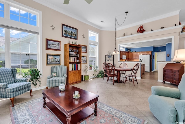 1249 Trent Dr, Murrells Inlet, SC 29576 - living room featuring a towering ceiling, baseboards, ceiling fan, crown molding, and light tile patterned floors