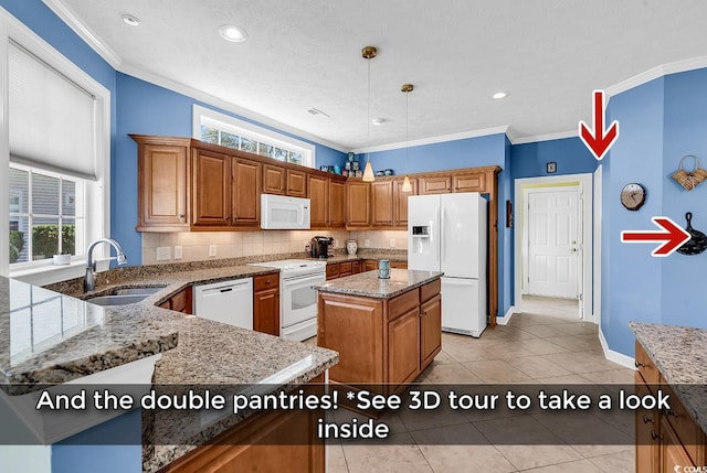 1249 Trent Dr, Murrells Inlet, SC 29576 - kitchen featuring crown molding, baseboards, a sink, and white appliances