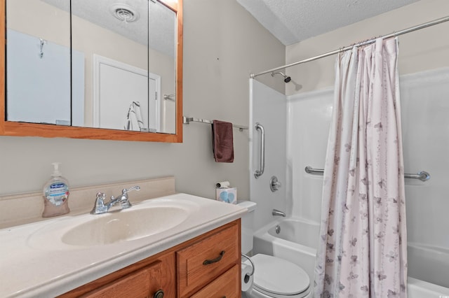 bathroom with toilet, vanity, shower / tub combo with curtain, a textured ceiling, and visible vents