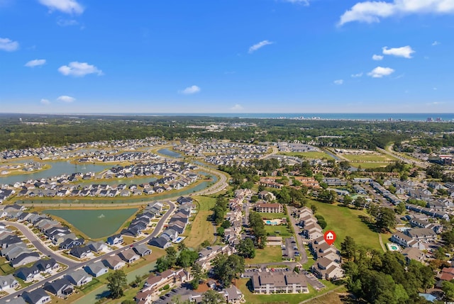 bird's eye view with a water view and a residential view