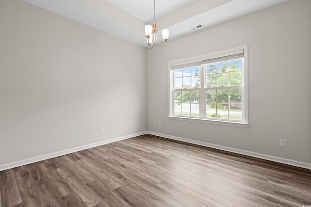 512 Charlton Blvd, Georgetown, SC 29440 - empty room with a chandelier, wood finished floors, and baseboards