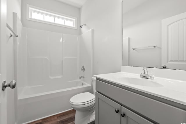 512 Charlton Blvd, Georgetown, SC 29440 - bathroom with vanity, toilet, tub / shower combination, and wood finished floors