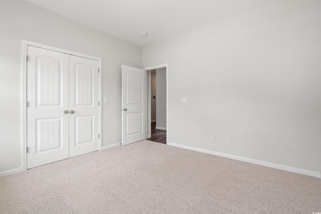 512 Charlton Blvd, Georgetown, SC 29440 - unfurnished bedroom featuring carpet flooring, a closet, and baseboards