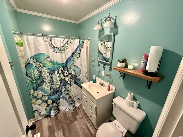 full bath with wood finished floors, ornamental molding, vanity, toilet, and curtained shower