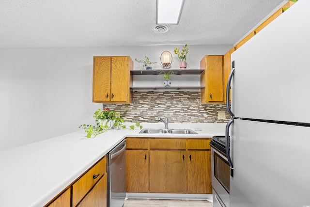 3700 Golf Colony Ln Unit 18-G, Little River, SC 29566 - kitchen with stainless steel appliances, a sink, light countertops, open shelves, and tasteful backsplash