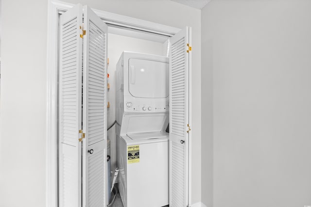 3700 Golf Colony Ln Unit 18-G, Little River, SC 29566 - laundry room with stacked washer / drying machine
