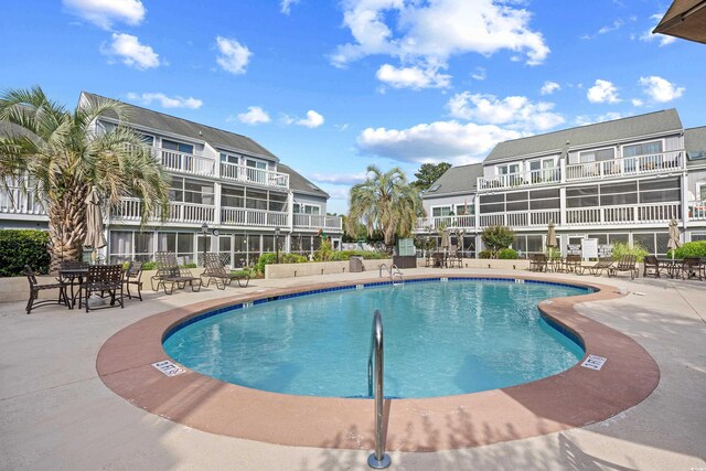 3700 Golf Colony Ln Unit 18-G, Little River, SC 29566 - community pool with a patio