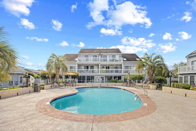 3700 Golf Colony Ln Unit 18-G, Little River, SC 29566 - community pool featuring a patio and fence