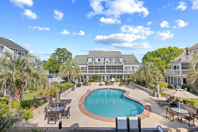 3700 Golf Colony Ln Unit 18-G, Little River, SC 29566 - community pool featuring a patio