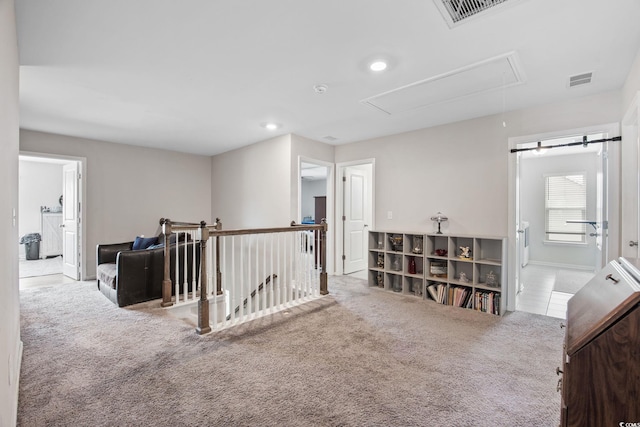 534 Pacific Commons Dr, Surfside Beach, SC 29575 - living area featuring attic access, an upstairs landing, carpet floors, and recessed lighting