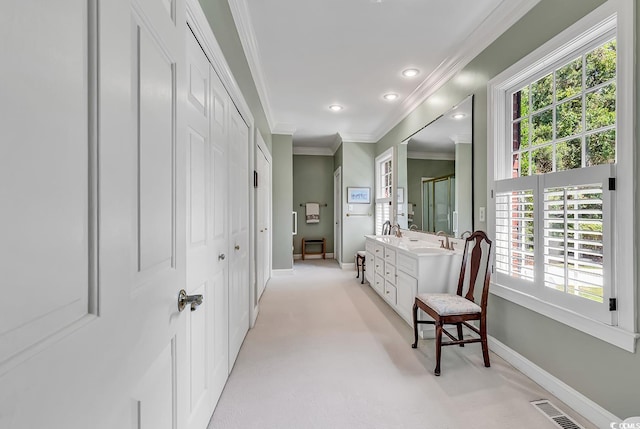 full bath featuring ornamental molding, baseboards, healthy amount of natural light, a shower with shower door, and recessed lighting