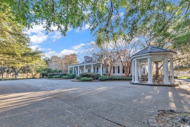 view of greek revival inspired property