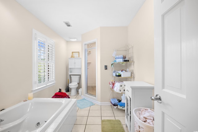 8231 Forest Lake Dr, Conway, SC 29526 - bathroom with tile patterned flooring, a whirlpool tub, toilet, baseboards, and a stall shower