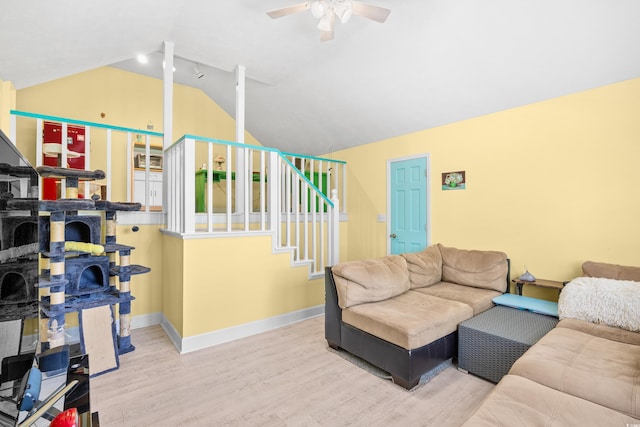 8231 Forest Lake Dr, Conway, SC 29526 - living room with stairway, lofted ceiling, wood finished floors, a ceiling fan, and baseboards