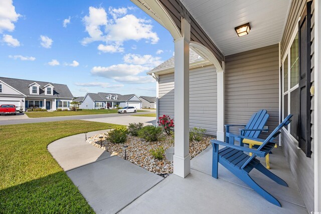 237 Copperwood Loop, Conway, SC 29526 - covered porch with a residential view and a lawn