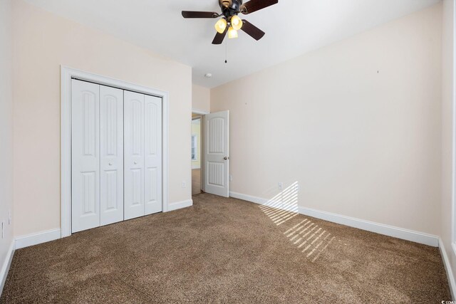 237 Copperwood Loop, Conway, SC 29526 - unfurnished bedroom with carpet flooring, a closet, baseboards, and a ceiling fan