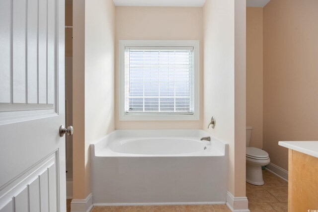 237 Copperwood Loop, Conway, SC 29526 - full bathroom featuring toilet, a bath, tile patterned floors, and baseboards