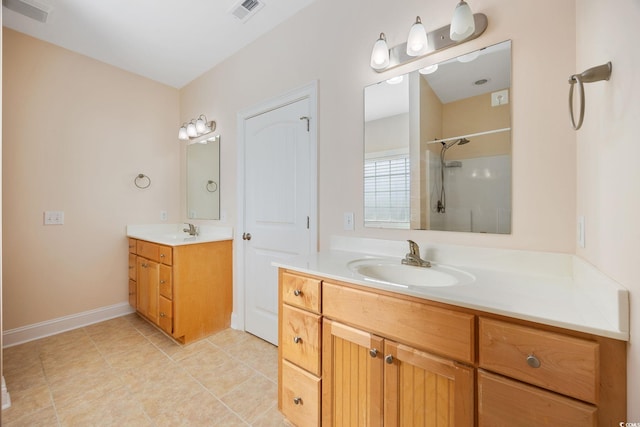 237 Copperwood Loop, Conway, SC 29526 - full bath featuring a shower, two vanities, tile patterned floors, and baseboards