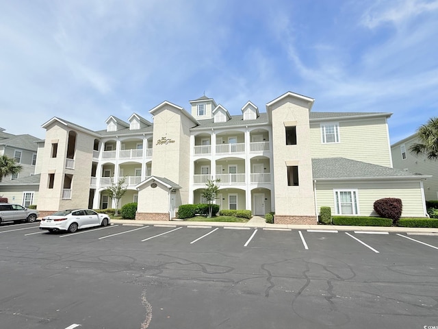 1025 World Tour Blvd Unit 205, Myrtle Beach, SC 29579 - view of building exterior featuring uncovered parking
