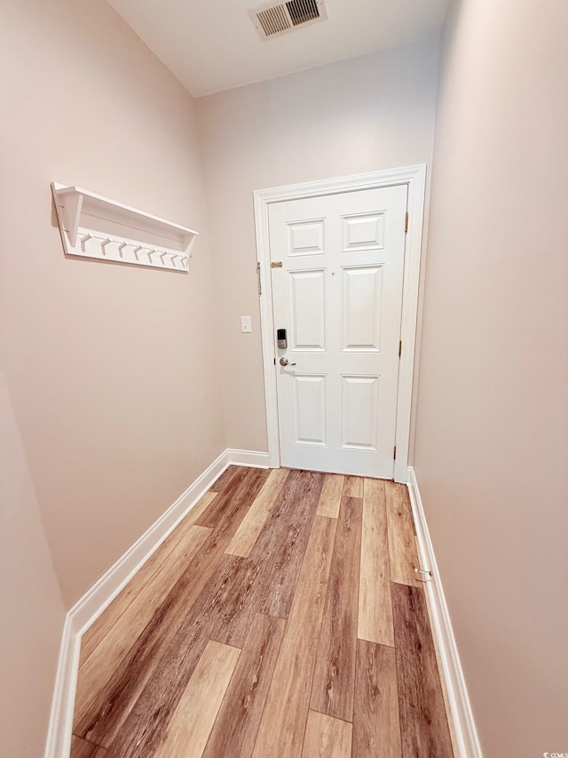 1025 World Tour Blvd Unit 205, Myrtle Beach, SC 29579 - doorway to outside with light wood-style flooring, visible vents, and baseboards