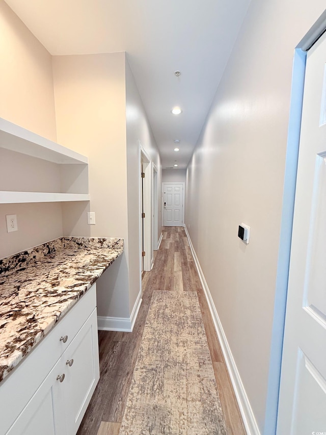 1025 World Tour Blvd Unit 205, Myrtle Beach, SC 29579 - hallway with baseboards, wood finished floors, and recessed lighting