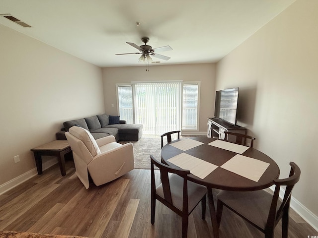 1025 World Tour Blvd Unit 205, Myrtle Beach, SC 29579 - living area with dark wood finished floors, visible vents, baseboards, and ceiling fan