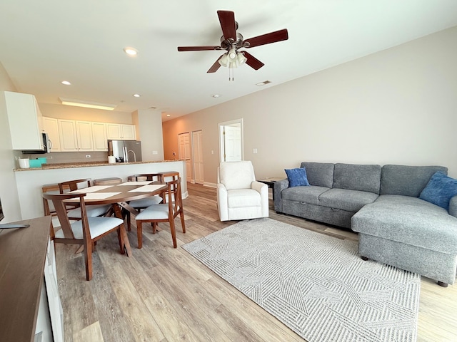 1025 World Tour Blvd Unit 205, Myrtle Beach, SC 29579 - living area with baseboards, visible vents, recessed lighting, light wood-style floors, and a ceiling fan