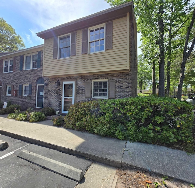 830 44th Ave N Unit B4, Myrtle Beach, SC 29577 - townhome / multi-family property featuring brick siding and uncovered parking