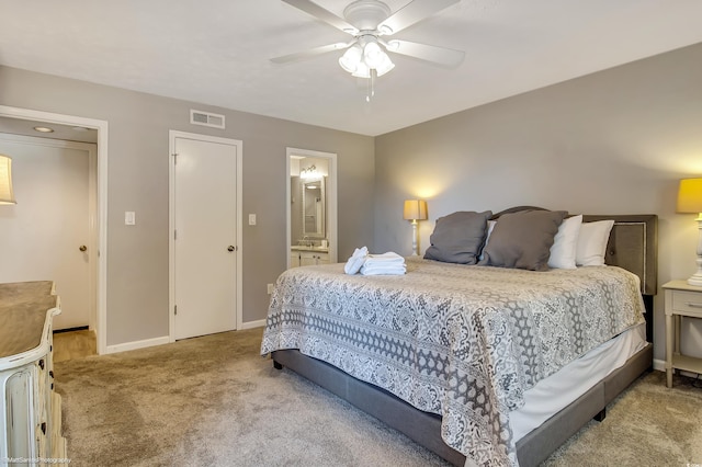 5507 N Ocean Blvd Unit 105, Myrtle Beach, SC 29577 - bedroom with carpet, ceiling fan, and ensuite bathroom