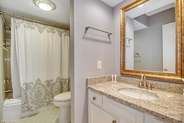 5507 N Ocean Blvd Unit 105, Myrtle Beach, SC 29577 - full bathroom with vanity, shower / tub combo, and tile patterned flooring