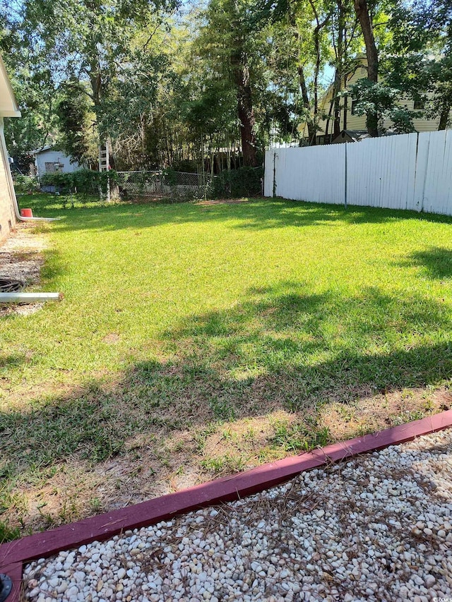 725 Juniper Dr, Surfside Beach, SC 29575 - view of yard