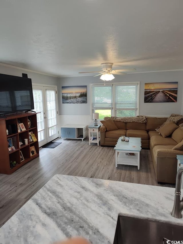 725 Juniper Dr, Surfside Beach, SC 29575 - living room with french doors, wood finished floors, and a ceiling fan