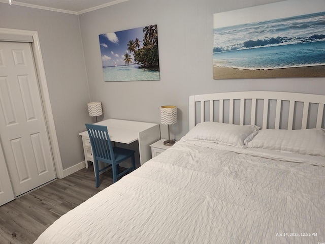 725 Juniper Dr, Surfside Beach, SC 29575 - bedroom featuring wood finished floors, ornamental molding, and baseboards