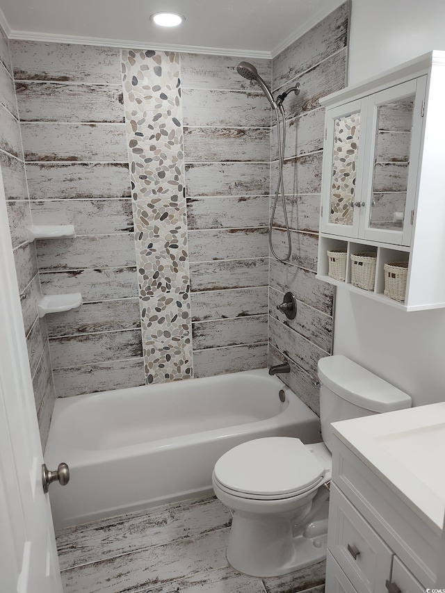 725 Juniper Dr, Surfside Beach, SC 29575 - bathroom featuring toilet, washtub / shower combination, vanity, and ornamental molding