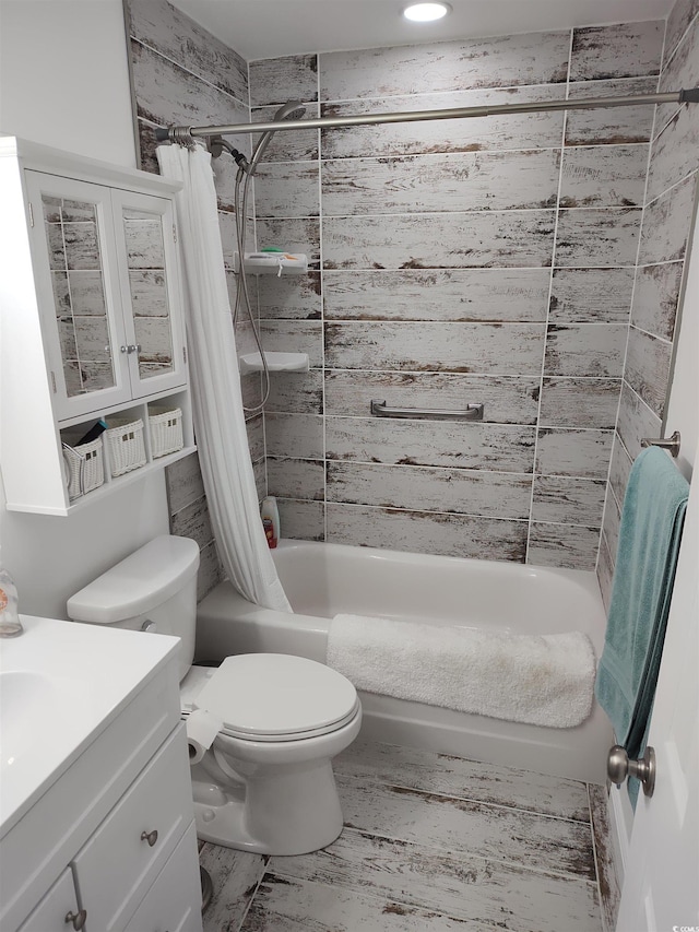 725 Juniper Dr, Surfside Beach, SC 29575 - bathroom featuring shower / bath combo, toilet, and vanity