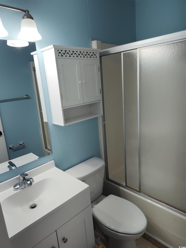 725 Juniper Dr, Surfside Beach, SC 29575 - full bathroom with toilet, shower / bath combination with glass door, and vanity