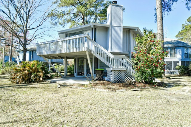 742 Tall Oaks Ct, Myrtle Beach, SC 29588 - back of property with a patio, stairs, and a deck
