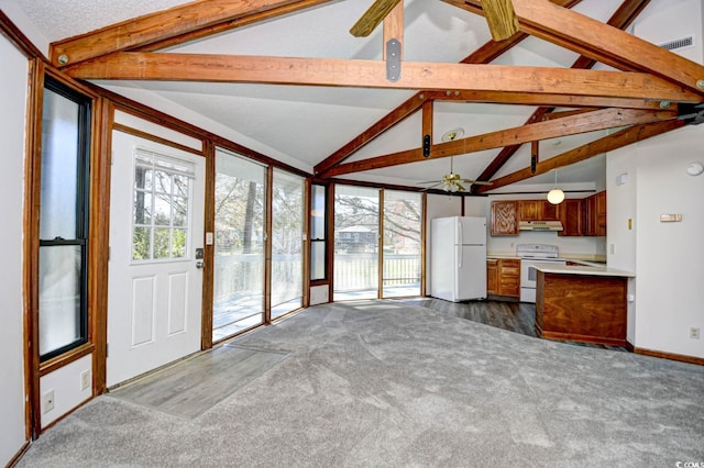 742 Tall Oaks Ct, Myrtle Beach, SC 29588 - unfurnished living room with dark colored carpet, a ceiling fan, baseboards, and vaulted ceiling with beams