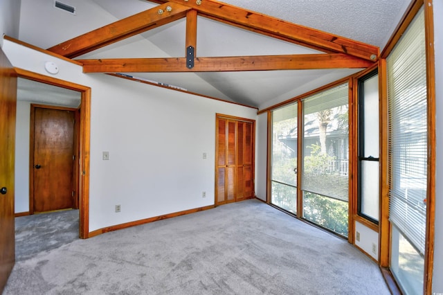 742 Tall Oaks Ct, Myrtle Beach, SC 29588 - carpeted spare room with lofted ceiling with beams, baseboards, and visible vents