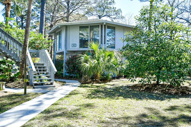742 Tall Oaks Ct, Myrtle Beach, SC 29588 - view of front of house featuring a front yard and stairs