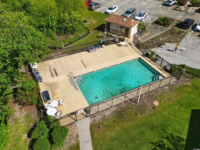 community pool featuring fence