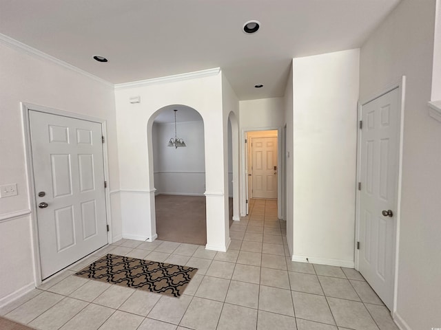 514 Hay Hill Ln Unit C, Myrtle Beach, SC 29579 - foyer entrance with arched walkways, light tile patterned flooring, baseboards, crown molding, and recessed lighting