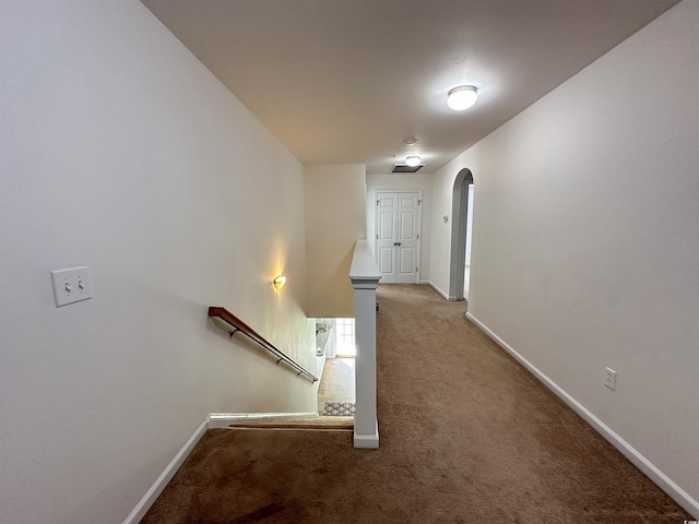 514 Hay Hill Ln Unit C, Myrtle Beach, SC 29579 - corridor featuring an upstairs landing, arched walkways, light carpet, and baseboards