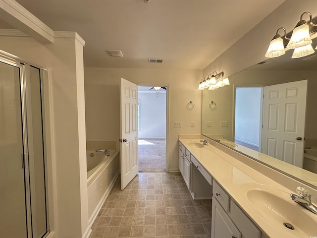514 Hay Hill Ln Unit C, Myrtle Beach, SC 29579 - bathroom featuring double vanity, a shower stall, a garden tub, baseboards, and ceiling fan